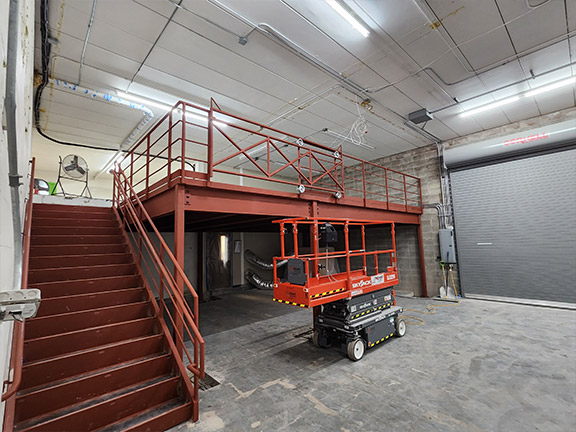 Structural steel stairs and raised platform